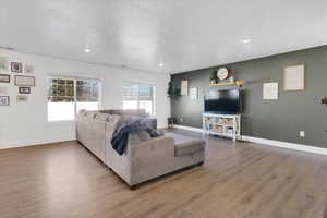 Living room featuring hardwood / wood-style floors