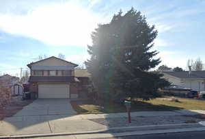 View of front of home with a garage