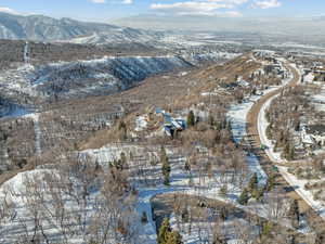 Snowy aerial view with a mountain view