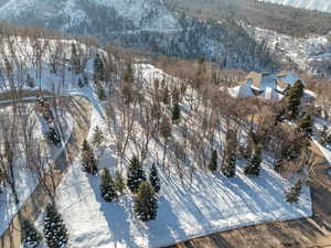 Snowy aerial view with a mountain view