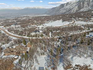 Snowy aerial view with a mountain view