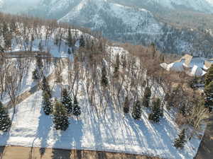 Snowy aerial view with a mountain view