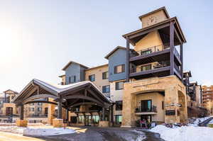 View of snow covered property