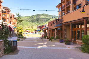 Surrounding community featuring a mountain view