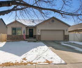 Single story home with a garage