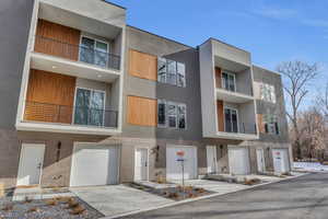 View of building exterior with a garage