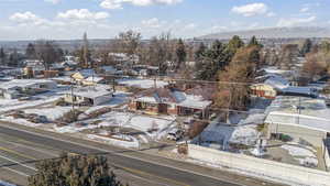 Snowy aerial view with a mountain view