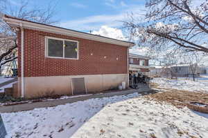 View of snow covered property