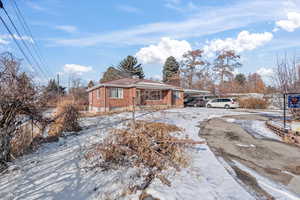 Ranch-style home with a carport