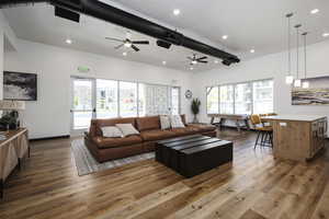 Living room with hardwood / wood-style floors