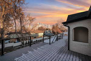 Deck at dusk with a mountain view