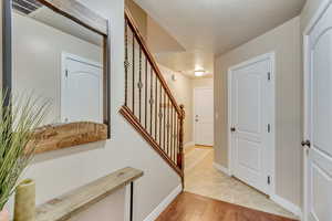 Entryway with light wood-type flooring