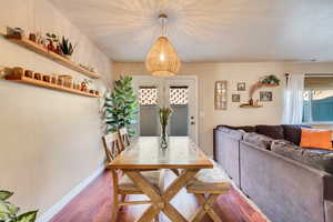 Dining space featuring dark hardwood / wood-style flooring