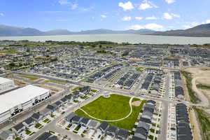 Aerial view featuring a water and mountain view