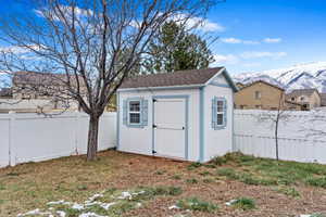 View of shed with a mountain view