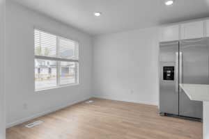 Interior space with light hardwood / wood-style floors