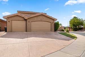 Mediterranean / spanish-style home featuring a garage