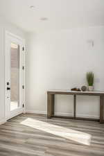 Doorway featuring hardwood / wood-style flooring