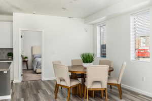 Dining area featuring hardwood / wood-style flooring