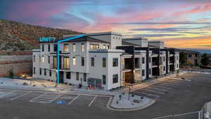 View of outdoor building at dusk