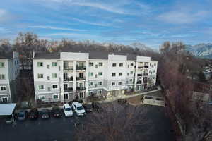 View of property with a mountain view