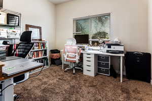 View of carpeted home office