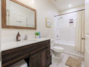 Full bathroom featuring vanity, tiled shower / bathtub combination.