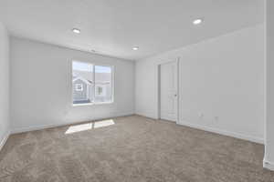 View of carpeted spare room