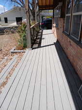 Deck featuring a carport