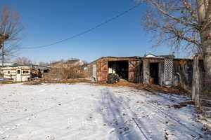 Exterior space with an outbuilding