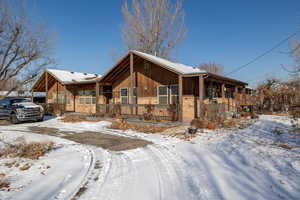 View of front of house with covered porch