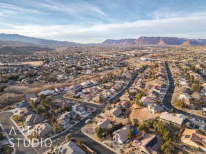 Birds eye view of property with a mountain view