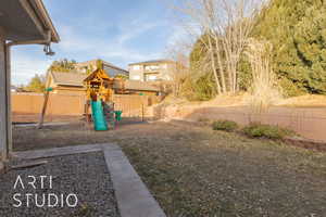 View of yard featuring a playground