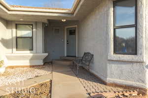 Entrance to property with a patio area