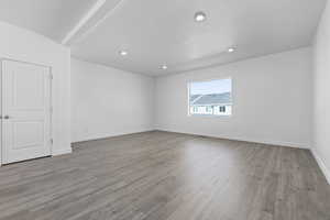 Spare room with light hardwood / wood-style floors