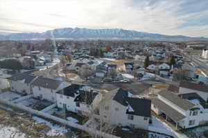 Birds eye view of property with a mountain view