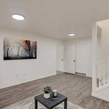 Living room featuring hardwood / wood-style flooring