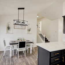 Kitchen featuring pendant lighting and hardwood / wood-style floors