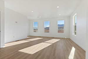 Unfurnished room featuring light hardwood / wood-style floors