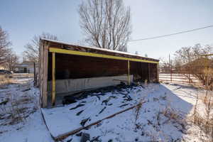 View of snow covered property