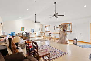 Living room with lofted ceiling