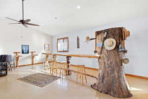 Dining area featuring vaulted ceiling