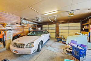 Garage featuring a garage door opener