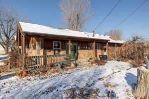 View of front of home featuring covered porch