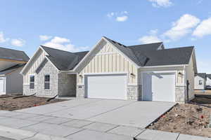 View of front of property featuring a garage