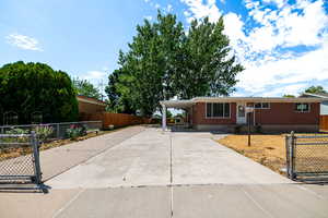 Totally secure fenced in home and driveway