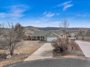 Ranch-style home featuring a mountain view