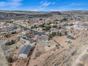 Birds eye view of property with a mountain view