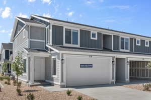 View of front of property with a garage