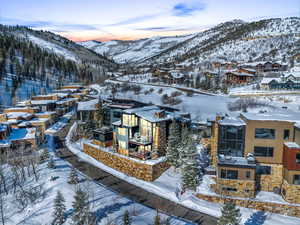 Snowy aerial view with a mountain view